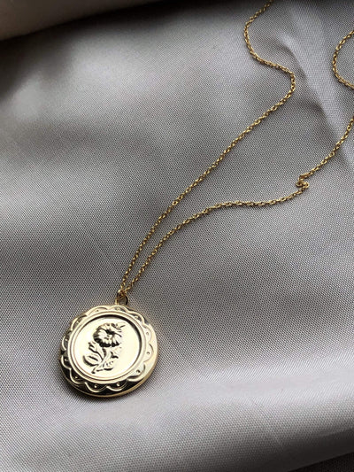 Flower locket necklace